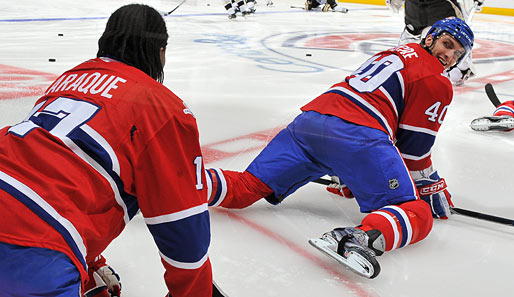 Wir wolln die Raupe sehn! Maxim Lapierre (r.) und Georges Laraque von den Montreal Canadiens bei ihren Aufwärmübungen