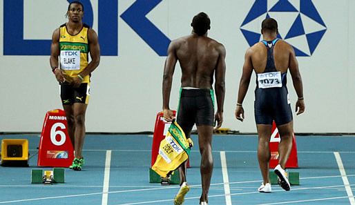 Tag 2: Eigentlich war für Usain Bolt (M.) über 100 Meter Gold reserviert, doch der Superstar nahm sich mit einem Fehlstart selbst aus dem Rennen. Landsmann Blake (l.) profitierte
