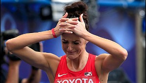 So sehen Sieger aus, nicht. Die Amerikanerin Georganne Molina war nach dem Vorlauf über 400 Meter Hürden völlig mit den Nerven am Ende