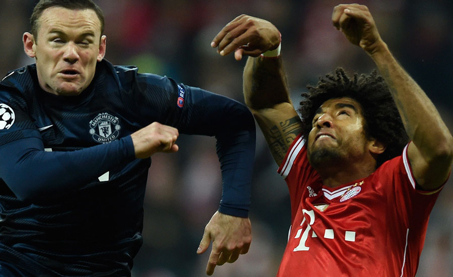 Augen zu und durch: Dass Rooney auch anders kann, zeigt er im Duell mit Bayern-Verteidiger Dante