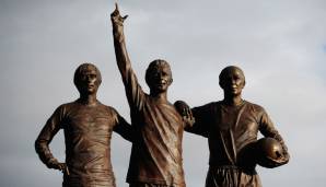 George Best, Denis Law, Bobby Charlton: An das magische Trio von Manchester United wird direkt vor dem Old Trafford erinnert. Best, Law und Charlton führten die "Red Devils" zum ersten Europapokal-Sieg eines englischen Vereins im Jahr 1968.