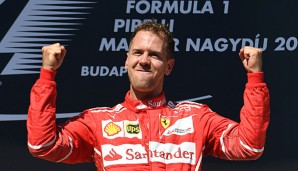 Ferrari-Fahrer Sebastian Vettel kann in Ungarn dank Teamkollege Räikkönnen jubeln