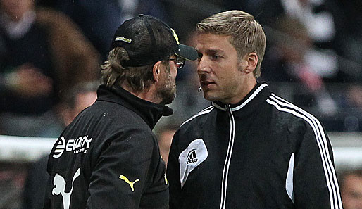 Im Spiel gegen Eintracht Frankfurt beschwerte sich Jürgen Klopp (l.) lautstark beim vierten Offiziellen Guido Kleve