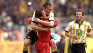 Markus Brzenska und Roman Weidenfeller bejubeln einen Derbysieg gegen Schalke.