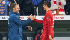Profitieren auf und neben dem Platz voneinander: Bayern-Torjäger Robert Lewandowski und Trainer Hansi Flick.