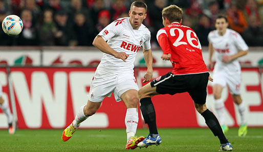 Lukas Podolski (l.) erzielte im Nachholspiel gegen Mainz 05 bereits seinen 14. Saisontreffer