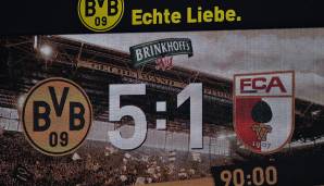 Dortmund schlägt Augsburg mit 5:1 und erobert am 1. Spieltag direkt die Tabellenspitze. Sancho, Reus und Alcacer stechen bei der Borussia heraus. Der Augsburger Keeper Koubek legte einen kuriosen Auftritt hin. Die Noten und Einzelkritiken.