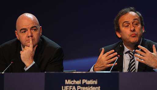 Die UEFA-Verantwortlichen um Platini (r.) und Infantino wollen den Spielkalender reformieren