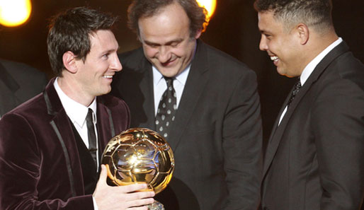 Lionel Messi (l.) ist Weltfußballer des Jahres 2011