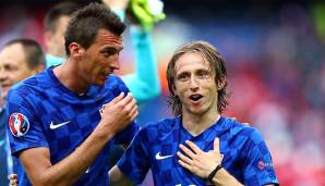 Platz 3: Die Kroaten feierten durch den WM-Finaleinzug den größten Erfolg der Nationalmannschafts-Geschichte. Spielmacher Luka Modric (r.) setzt spielentscheidende Impulse, muss aber in Zukunft auf Mario Mandzukic (l.) verzichten.