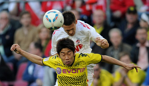 Sehen sich in der Premier League wieder: Sascha Riether (hinten) und Shinji Kagawa