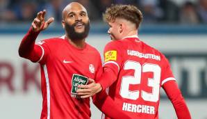 Terrence Boyd (l.) schoss den 1. FC Kaiserslautern mit zwei Toren zum Sieg bei Hansa Rostock.