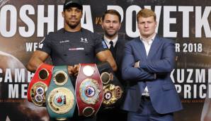 Weltmeister Anthony Joshua (l.) und Herausforderer Povetkin (r.).