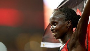 Strahlendes Lachen: Die Kenianerin Vivian Cheruiyot holt Gold über 10 000 m