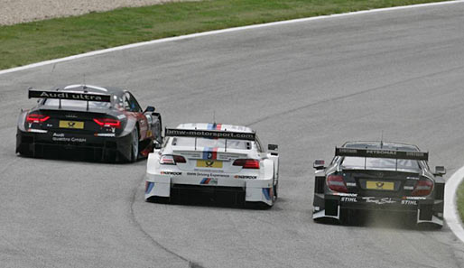 Die drei Hersteller der DTM-Saison 2012: Audi, BMW und Mercedes (v.l.)