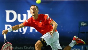 Philipp Kohlschreiber in Dubai beim Versuch den Ball zu erwischen