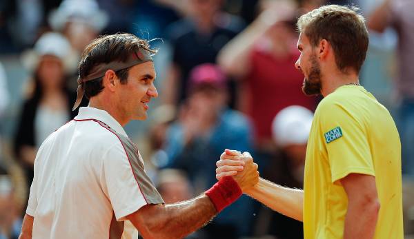 Oscar Otte (r.) und Roger Federer nach ihrem Duell bei den French Open 2019.