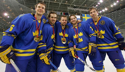 So sehen Olympiasieger aus: Die Tre Kronor beim Goldmedaillengewinn 2006 in Turin