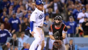 Justin Turner greift sich an den verletzten Oberschenkel