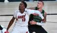 Daniel Theis (r.) muss gegen die Miami Heat permanent All-Star Bam Adebayo beackern.
