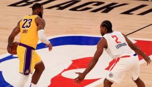 LeBron James (l.) und Kawhi Leonard treffen bei der NBA Opening Night aufeinander.
