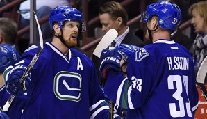 Henrik Sedin (r.) und Daniel Sedin harmonieren prächtig