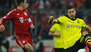 Philipp Lahm (l.) und Robert Lewandowski spielen seit dem Sommer im gleichen Team