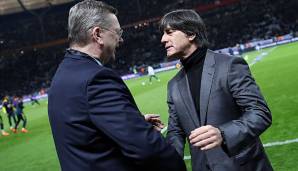 DFB-Präsident Reinhard Grindel hält an Jogi Löw fest.