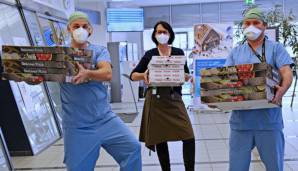 Die Covid19-Intensivstation des Münchner Krankenhauses Barmherzige Brüder mit ihrer Pizza-Lieferung.