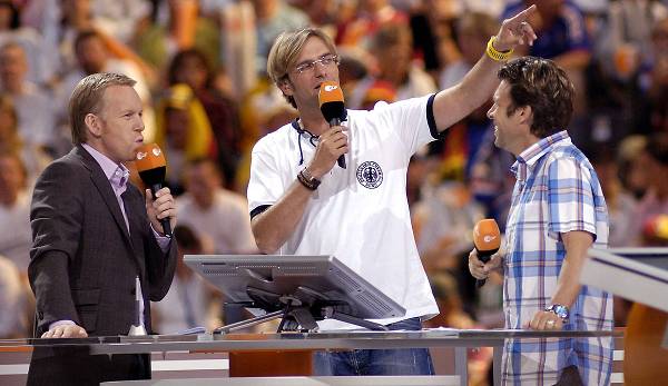 Jürgen Klopp (Mitte) mit Johannes B. Kerner und Urs Meier als "TV-Bundestrainer" 2006.