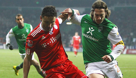 Mark van Bommel (l.) und Torsten Frings werden sich im Pokalfinale im Mittelfeld begegnen