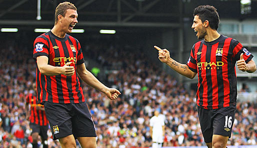 Edin Dzeko (l.) traf für Manchester City bei den Queens Park Rangers zum 1:1