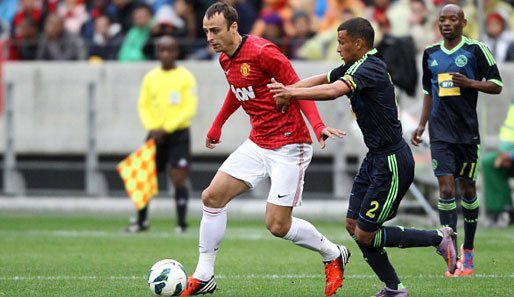 Dimitar Berbatow (l.) ging vier Jahre lang für Manchester United auf Torejagd