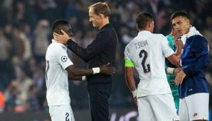 Thomas Tuchel und Idrissa Gueye nach dem CL-Erfolg von PSG gegen Real.