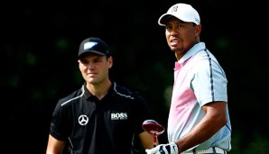 Martin Kaymer (l.) sorgt sich um die Gesundheit von Tiger Woods