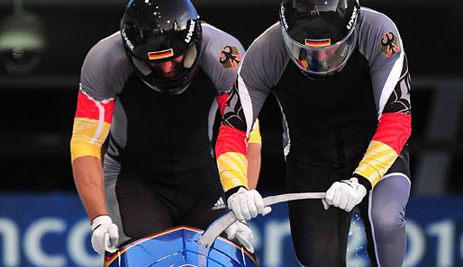 Andre Lange (r.) gewann in Turin sowohl im Zweier- als auch im Vierer-Bob Gold